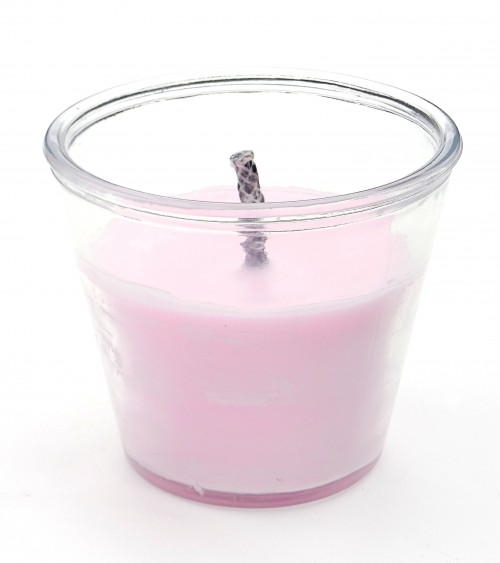 Bougie extérieure rose pastel en pot en verre