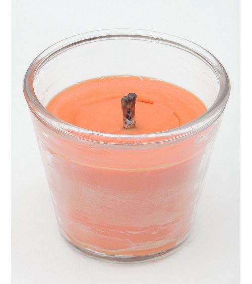 Bougie extérieure orange en pot en verre