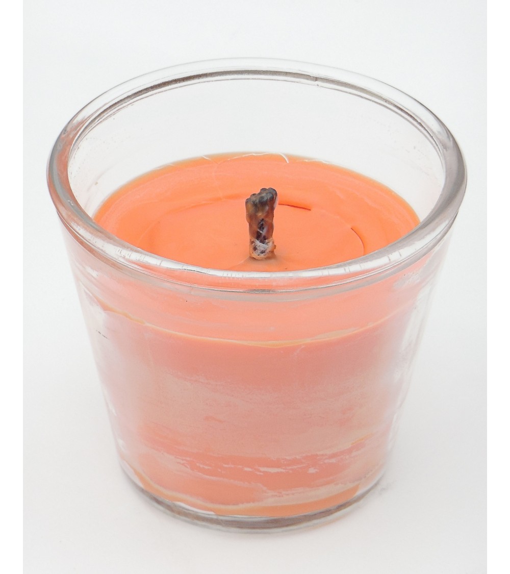Bougie extérieure orange en pot en verre