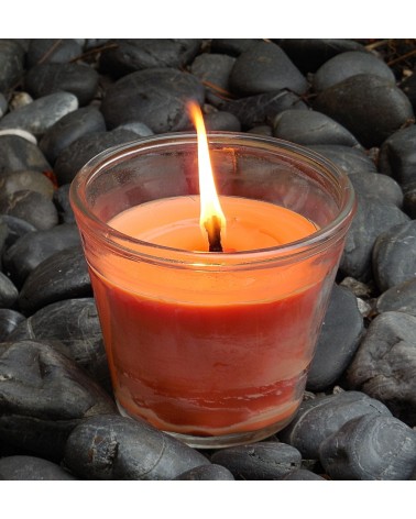 Bougie extérieure orange en pot en verre